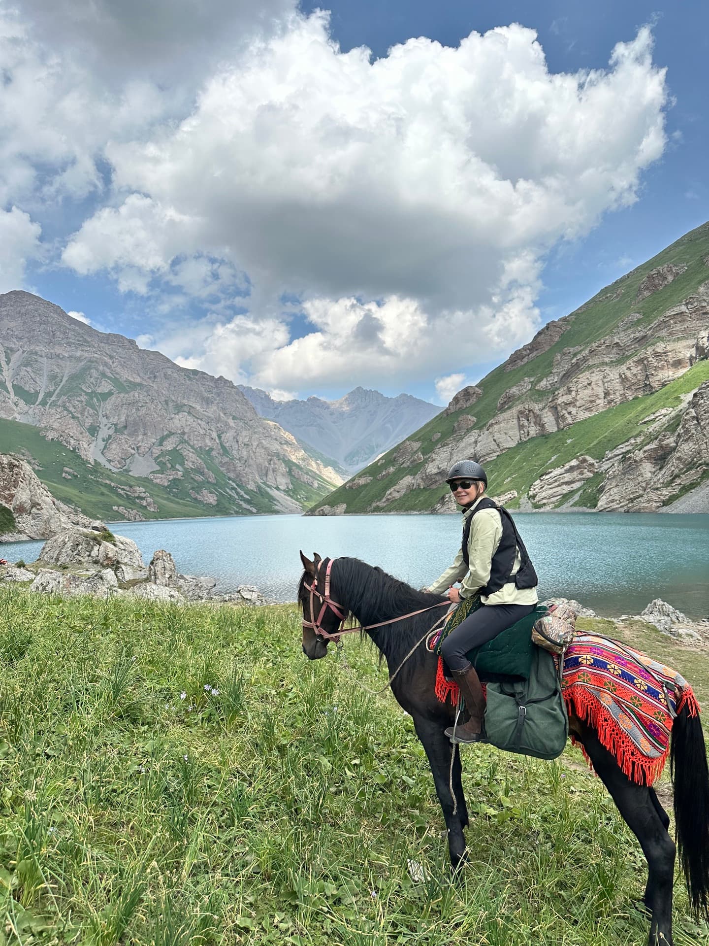 Rider overlooking Kel Suu canyon