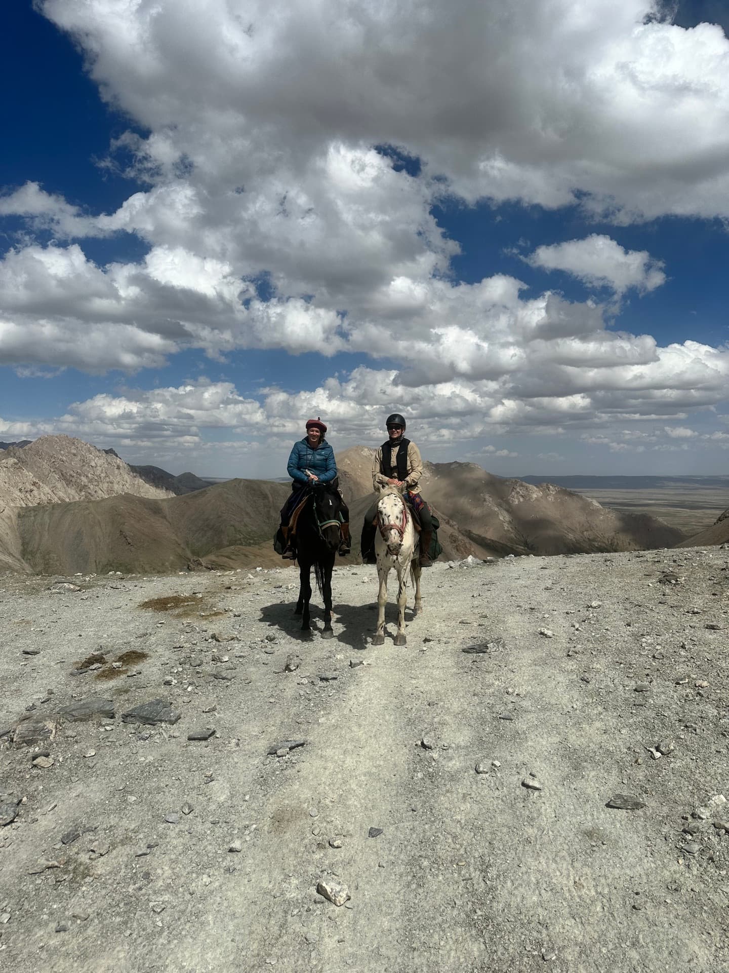 Riders in Kyrgyz mountains