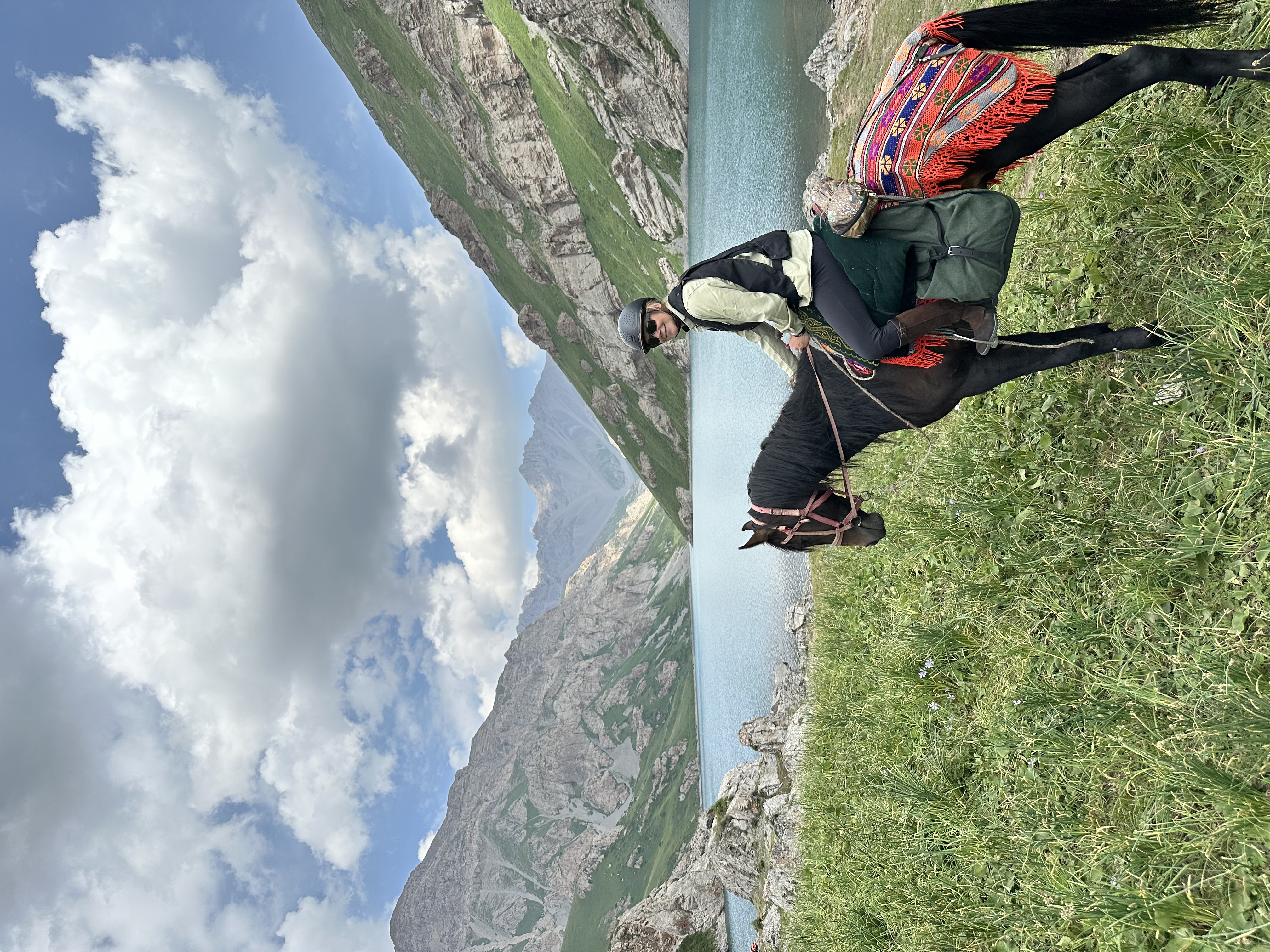 Rider overlooking Kel Suu canyon
