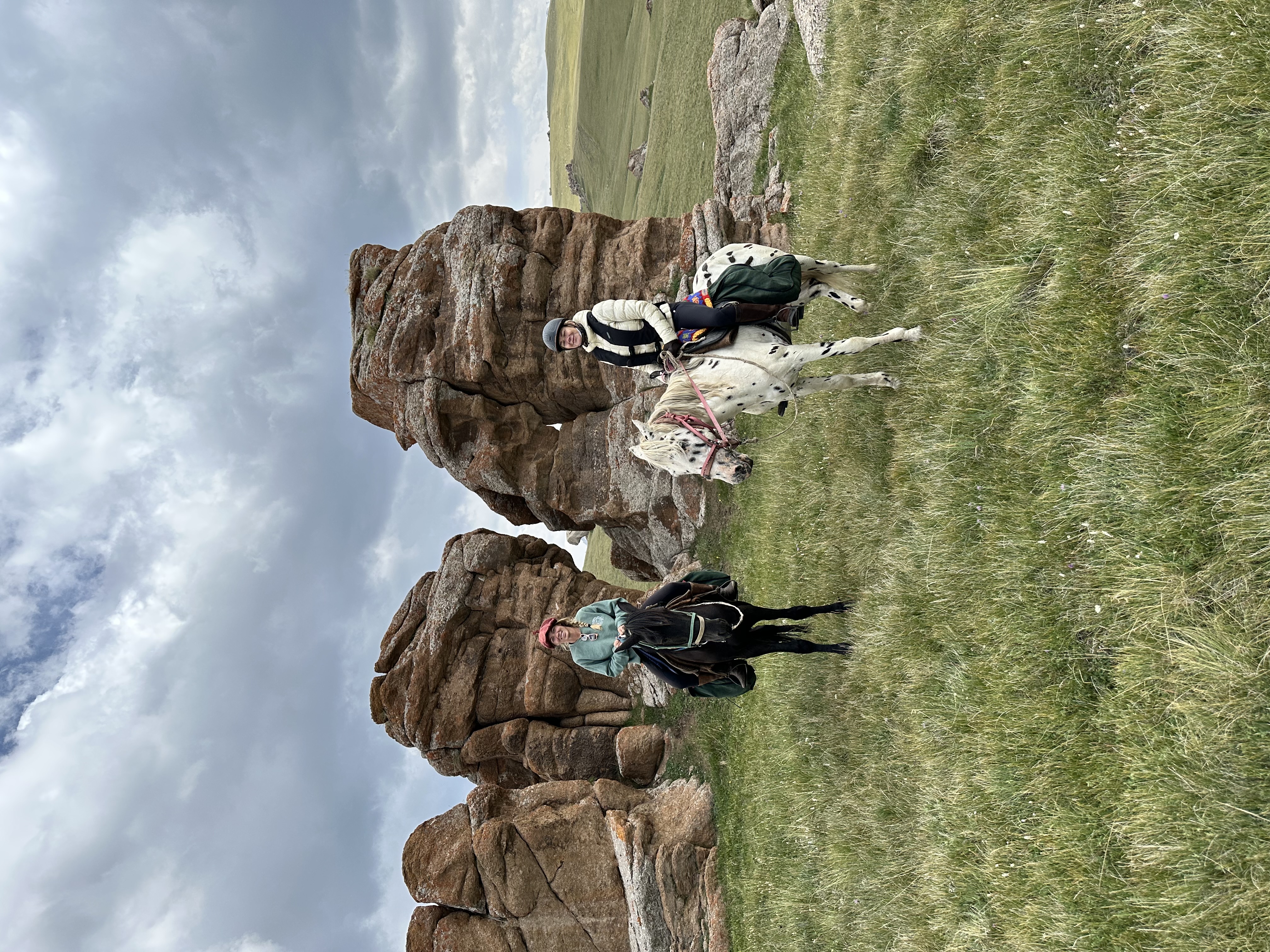 Riders in Kyrgyzstan highlands